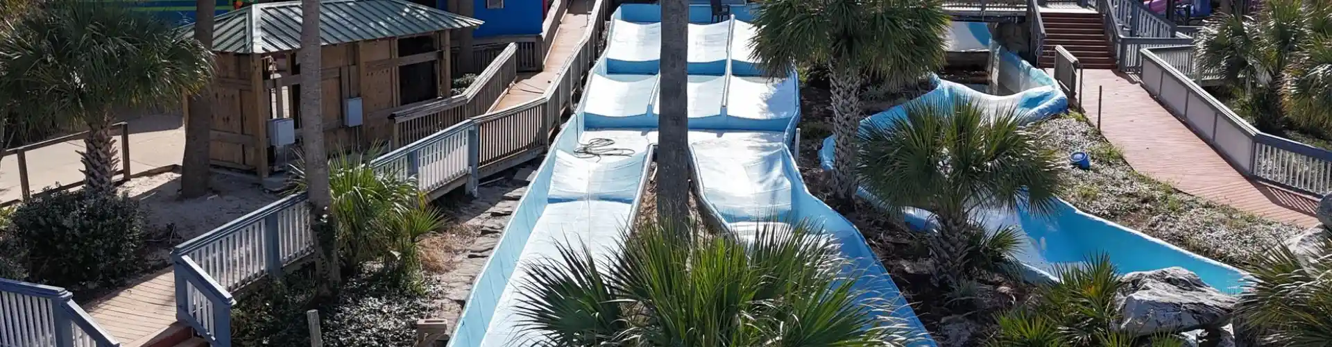 Resort slides are supported by commercial pool liner installation from Aquaholic Solutions in the United States.